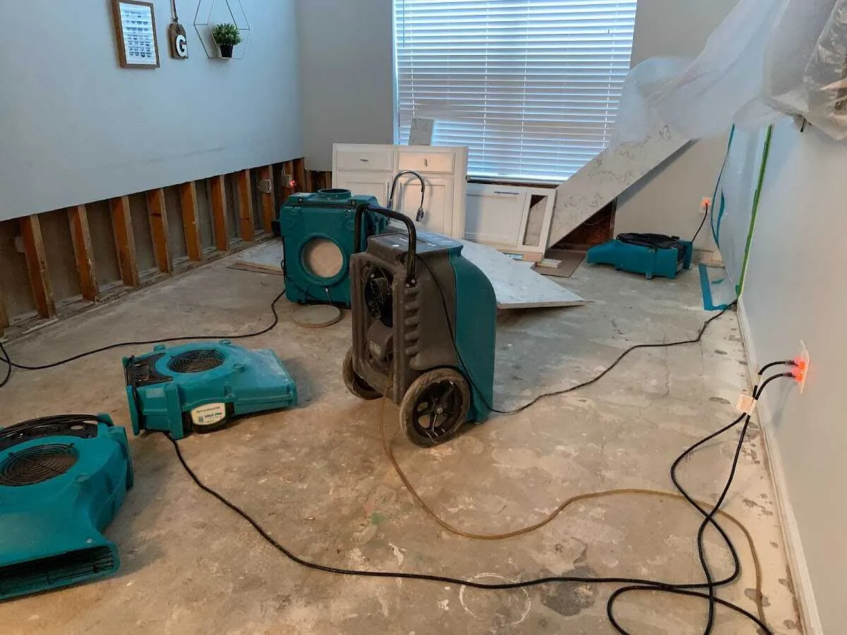 Dehumidifier in flood-cut room for Water Damage Restoration in Cheviot